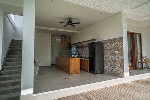Superior Double Room, Balcony, Pool View | Shared kitchen | Full-size fridge, microwave, coffee/tea maker, electric kettle