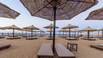 On the beach, white sand