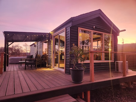 Terrace/patio. Cozy Tiny Home + Hot Tub | Oak trees, Trail & View