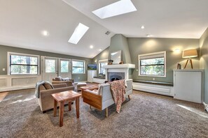 Smart TV, fireplace, books