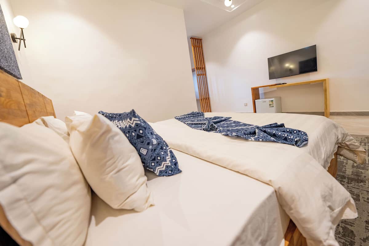 Family Suite, Patio, Garden View | Desk, soundproofing, free WiFi, bed sheets