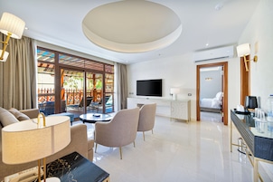 Villa | Living area | 30-inch Smart TV with cable channels