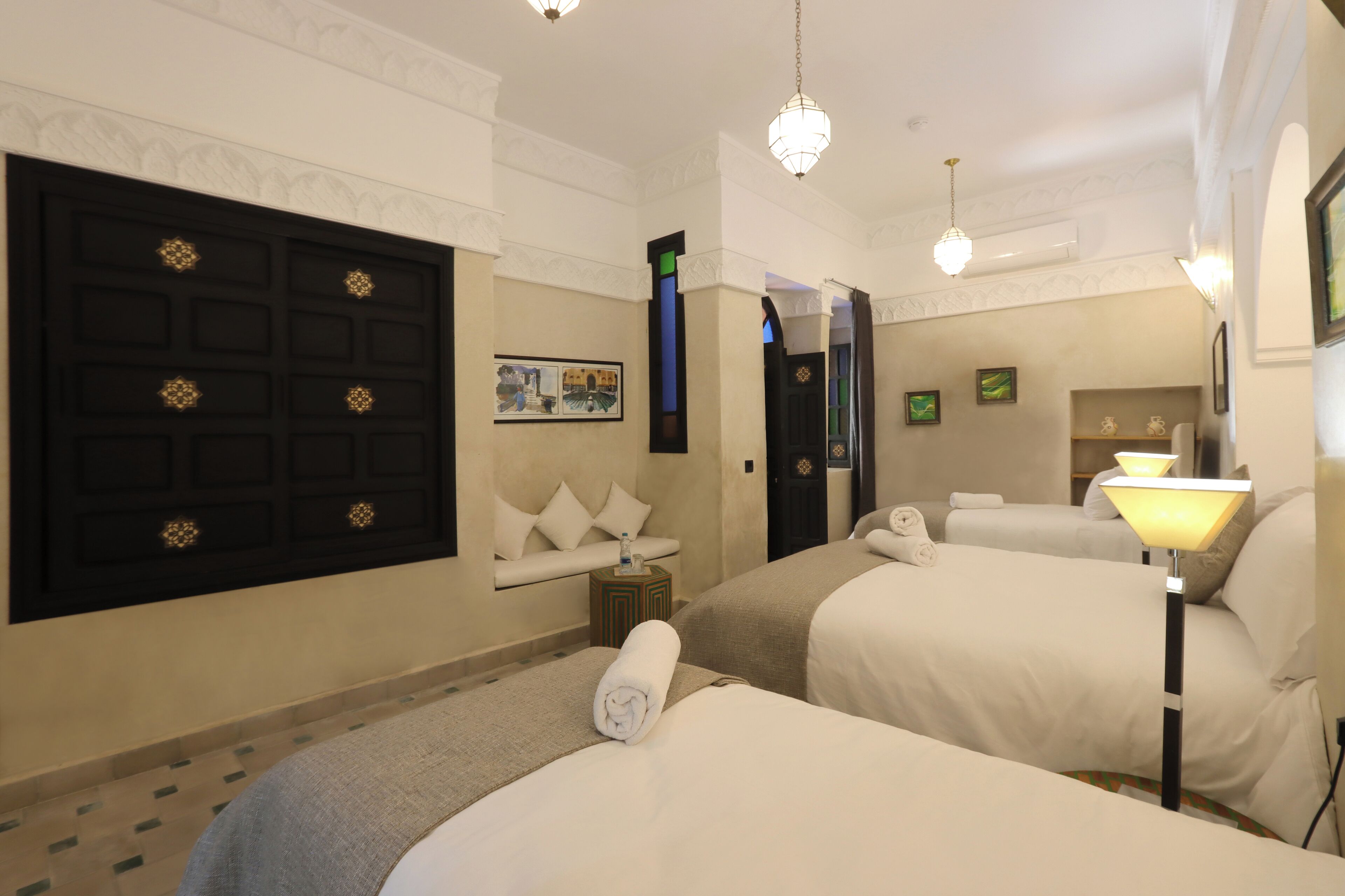 Family Quadruple Room, Courtyard View | In-room safe, blackout curtains, free WiFi