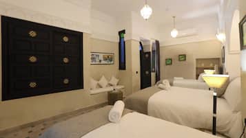 Family Quadruple Room, Courtyard View | In-room safe, blackout drapes, free WiFi