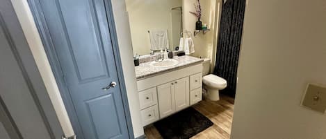Hair dryer, towels, soap, shampoo