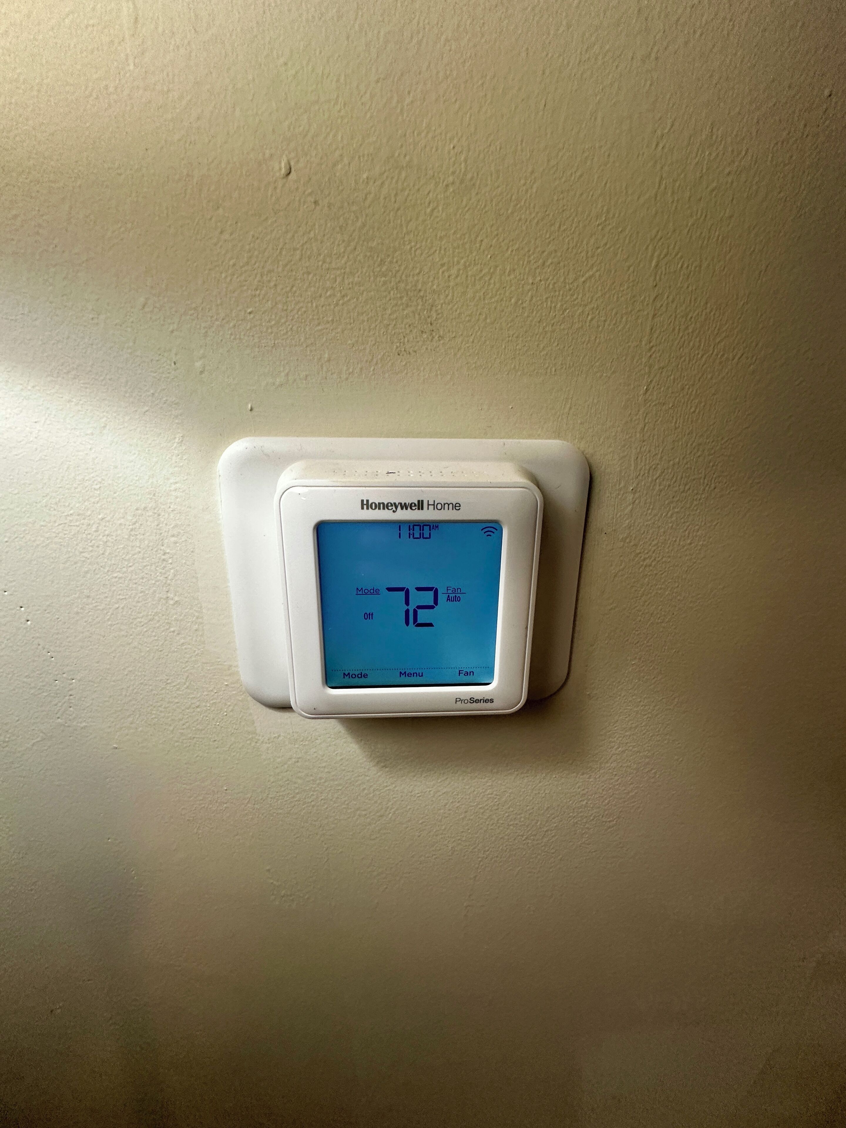 A Honeywell Home thermostat displaying a temperature of 72°F, with mode set to Auto.