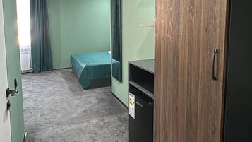 In-room safe, desk, laptop workspace, iron/ironing board