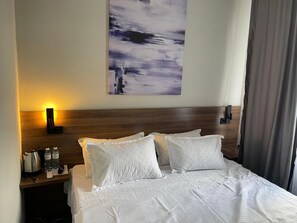 In-room safe, desk, laptop workspace, iron/ironing board