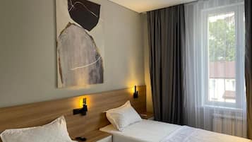 Twin Room | In-room safe, desk, laptop workspace, iron/ironing board