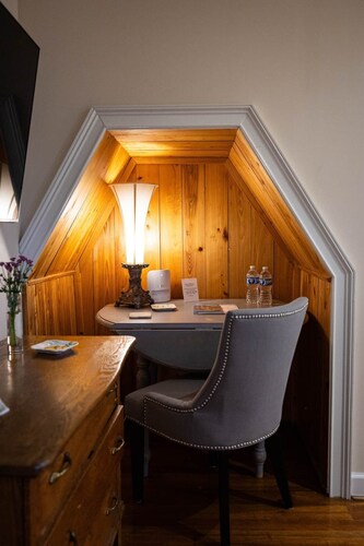 The State Room, The State Room - A refined escape inspired by Charleston’s historic charm.