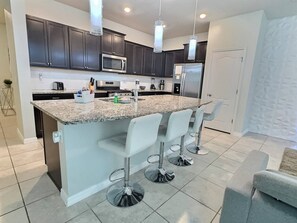 Fridge, microwave, oven, stovetop - Solterra 5BR Villa - Private Pool & Resort (Davenport)
