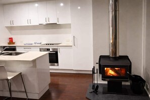 Coffee/tea maker, fridge, microwave, oven