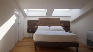 Deluxe Condo | In-room safe, blackout drapes, iron/ironing board, free WiFi