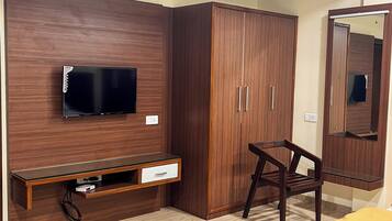 Luxury Quadruple Room, Balcony, City View | Television