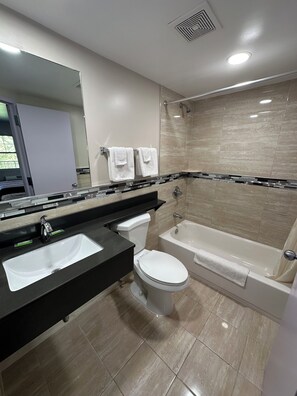Double Room, 2 Double Beds, Non Smoking | Bathroom | Combined shower/tub, towels, soap, toilet paper