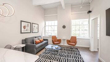 Apartment, Multiple Beds, Kitchen, City View (The 333 Suites 201) | Living area