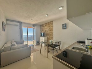 Departamento Deluxe, balcón | Escritorio, espacio para trabajar con laptop y wifi gratis