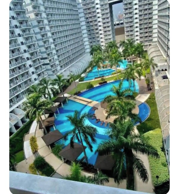 Apartment, 1 Bedroom, Smoking, Balcony | Pool | Outdoor pool - Elegant Pasay City Apartment With Central Heating & Shared Pool (Pasay)
