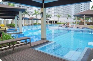 Apartment, 1 Bedroom, Smoking, Balcony | Pool - Elegant Pasay City Apartment With Central Heating & Shared Pool (Pasay)