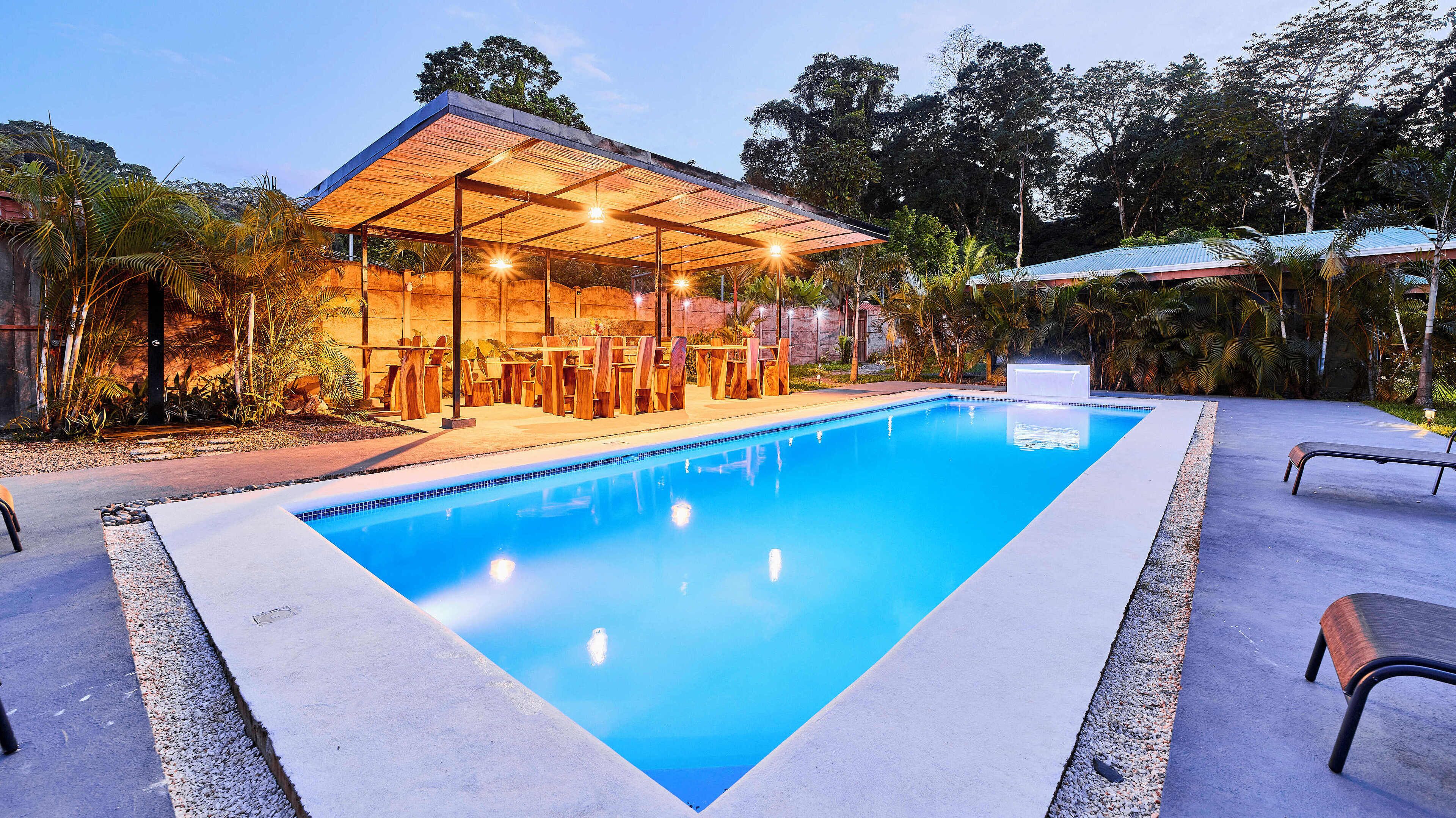 2 outdoor pools, open 9:00 AM to 9:00 PM, pool loungers