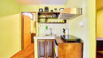 Villa, vistas al jardín | Cocina privada