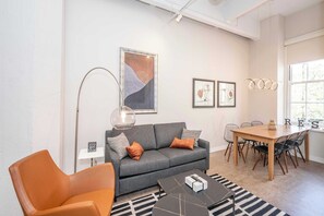 Apartment, Multiple Beds, Kitchen, City View (The 333 Suites 202) | Living area