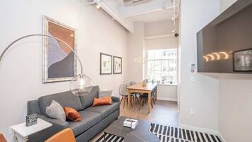 Apartment, Multiple Beds, Kitchen, City View (The 333 Suites 202) | Living area