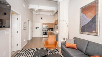 Apartment, Multiple Beds, Kitchen, City View (The 333 Suites 202) | Living area