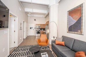 Apartment, Multiple Beds, Kitchen, City View (The 333 Suites 202) | Living area