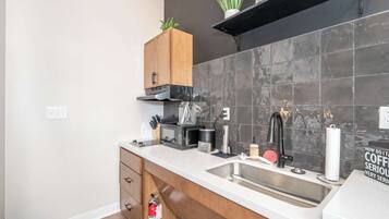 Studio, 1 Queen Bed, Kitchen, City View (The 333 Suites 204) | Private kitchen