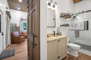 Shower, towels, soap, toilet paper