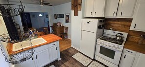 Microwave, oven, stovetop - Grandma's Cozy 2-bedroom retreat (Muskegon)