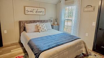 1 bedroom, desk, bed sheets