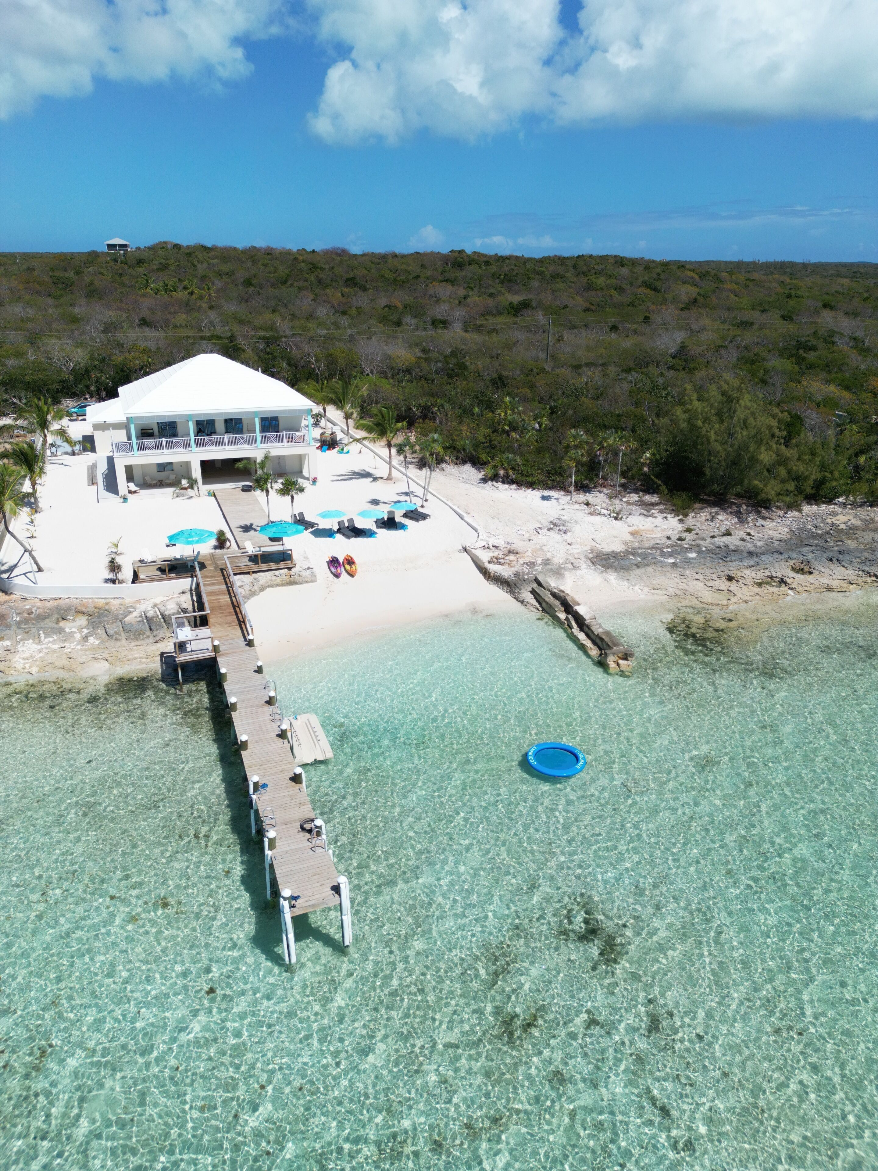 On the beach, sun loungers, beach towels