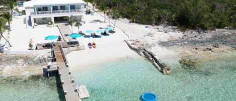 On the beach, sun-loungers, beach towels