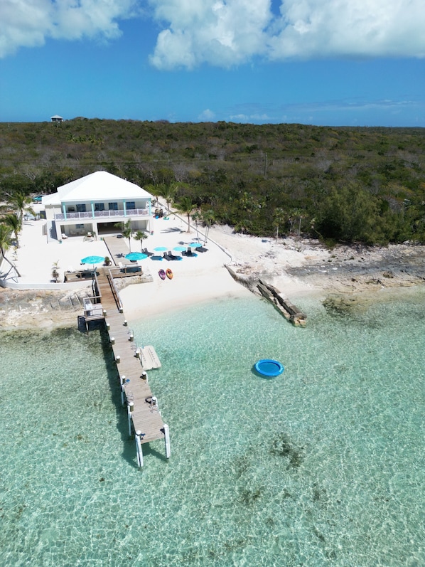 On the beach, sun loungers, beach towels