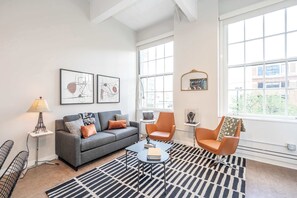 Apartment, Multiple Beds, Kitchen, City View (The 333 Suites 301) | Living area