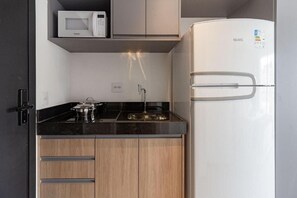 Fridge, microwave, cookware/dishes/utensils