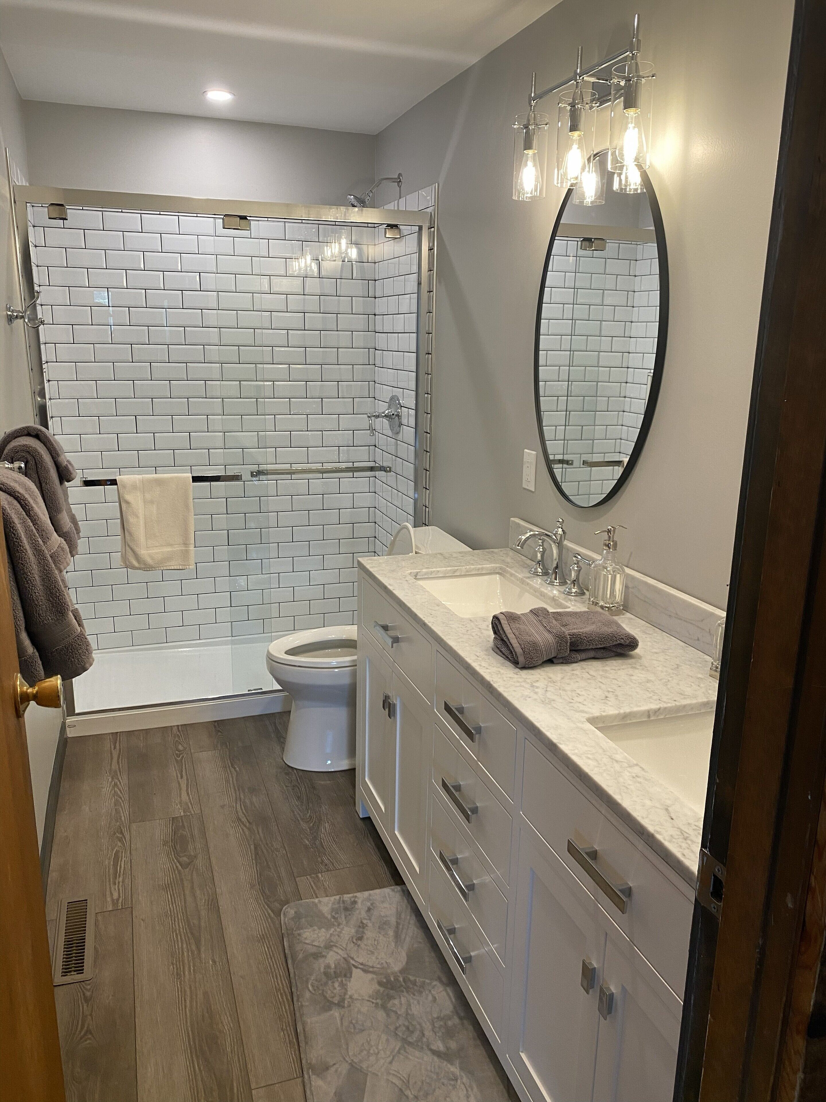 Shower, hair dryer, towels, toilet paper