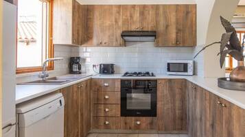 Microones, rentaplats i cafetera i tetera