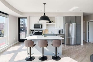 Fridge, microwave, oven, stovetop - Vibrant 2BR w/ King+Queen near DT MPLS | Pool (Minneapolis)