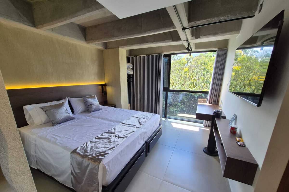 Minibar, desk, laptop workspace, blackout drapes