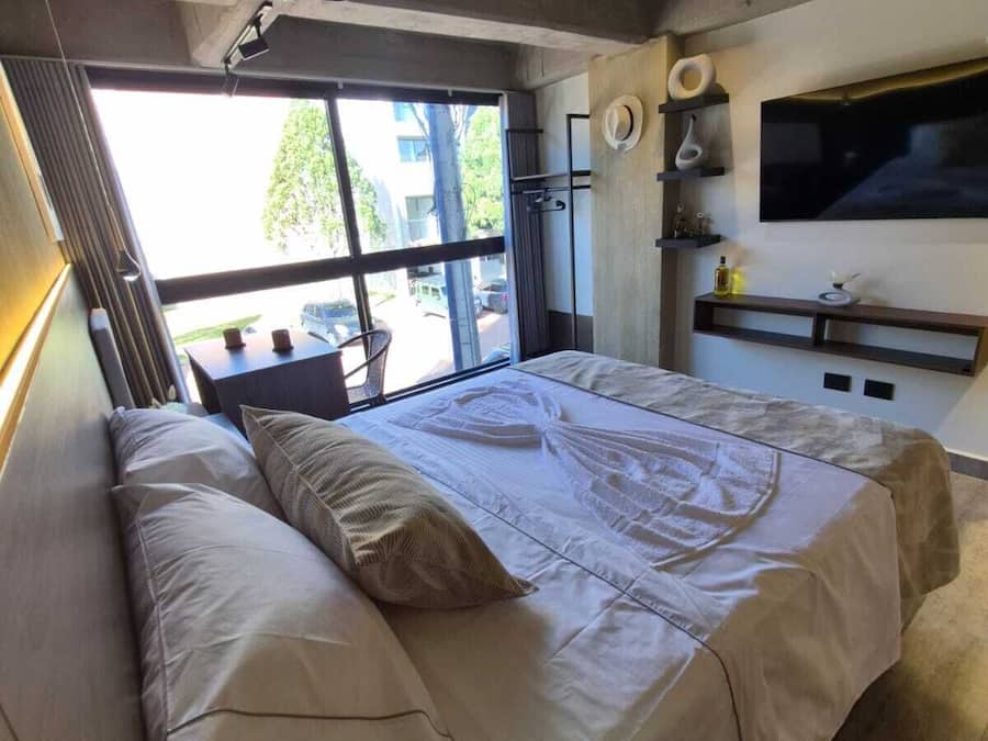 Minibar, desk, laptop workspace, blackout curtains