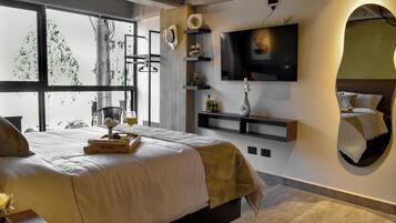 Minibar, desk, laptop workspace, blackout curtains