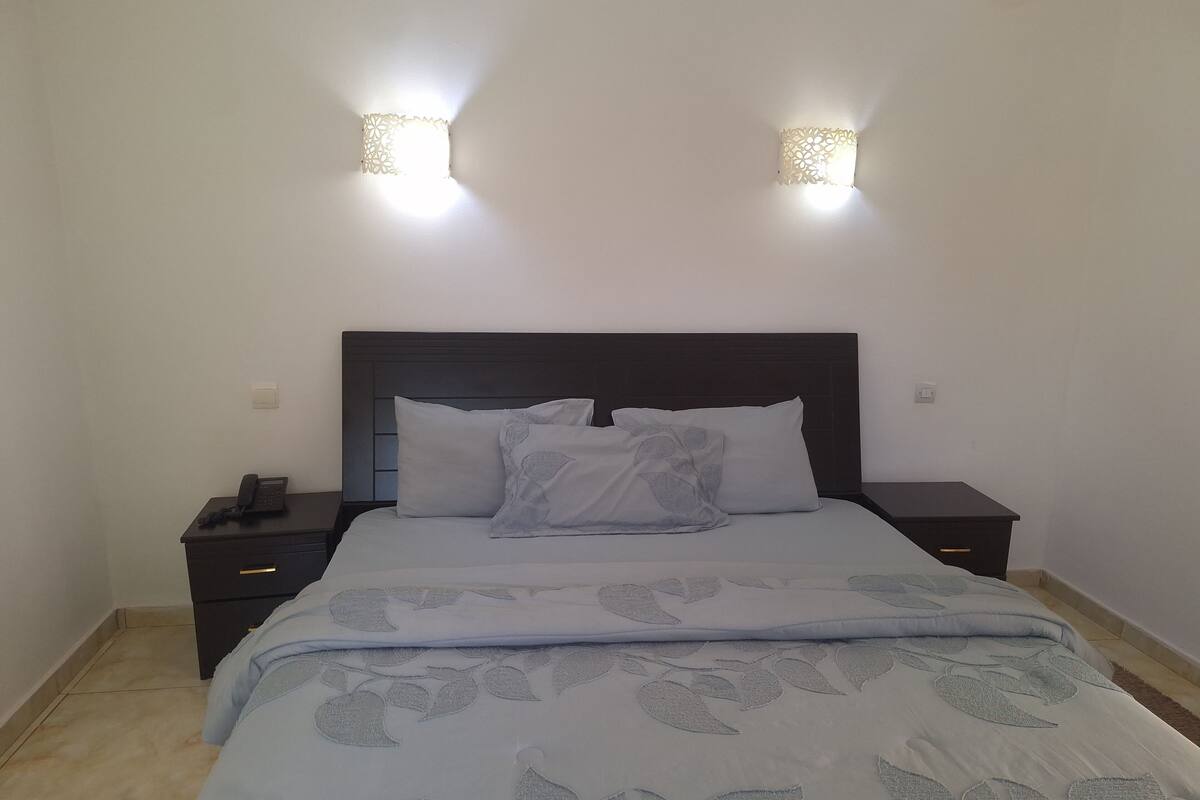 Economy Room, Pool View | Desk, laptop workspace, free WiFi