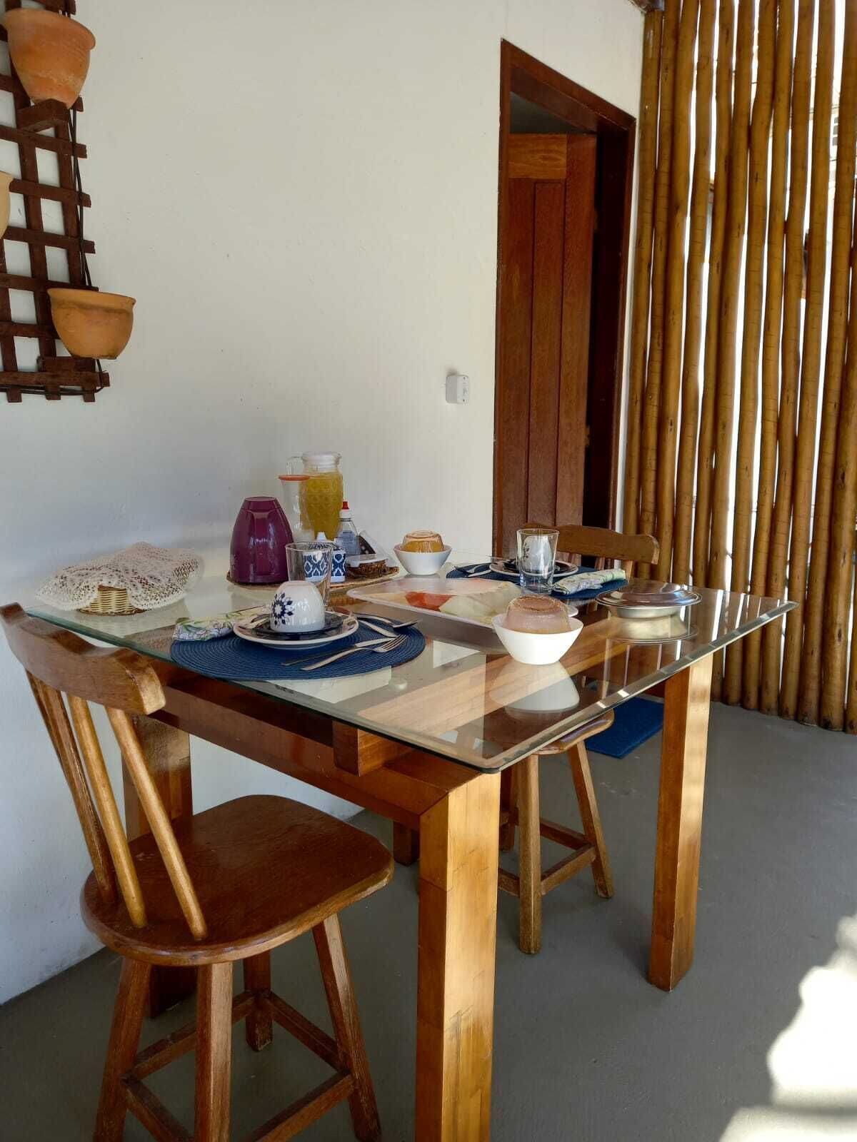 Suíte 1 com varanda | In-room dining