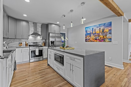 Fridge, microwave, oven, stovetop. Modern 3-Story Decatur Retreat, BBQ & Fire Pit