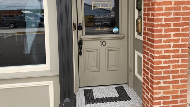 A front door with a sign for '2nd St Loft' and a 'Self Check In' option. - 2nd Street Loft - Riverview (Washington)