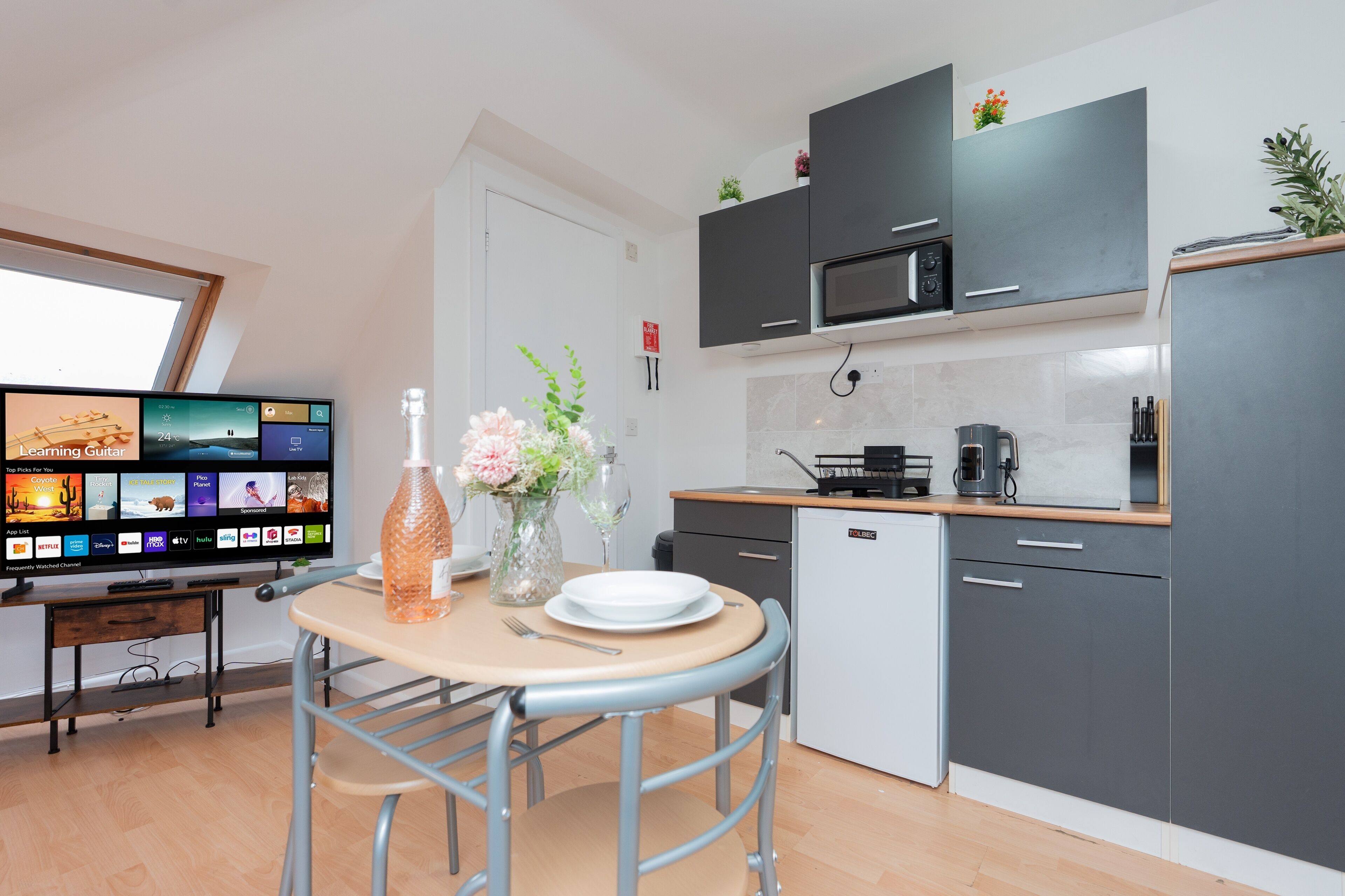 Fridge, microwave, toaster, cookware/dishes/utensils