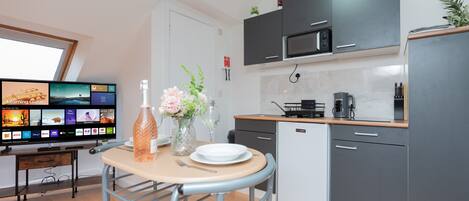 Fridge, microwave, toaster, cookware/dishes/utensils